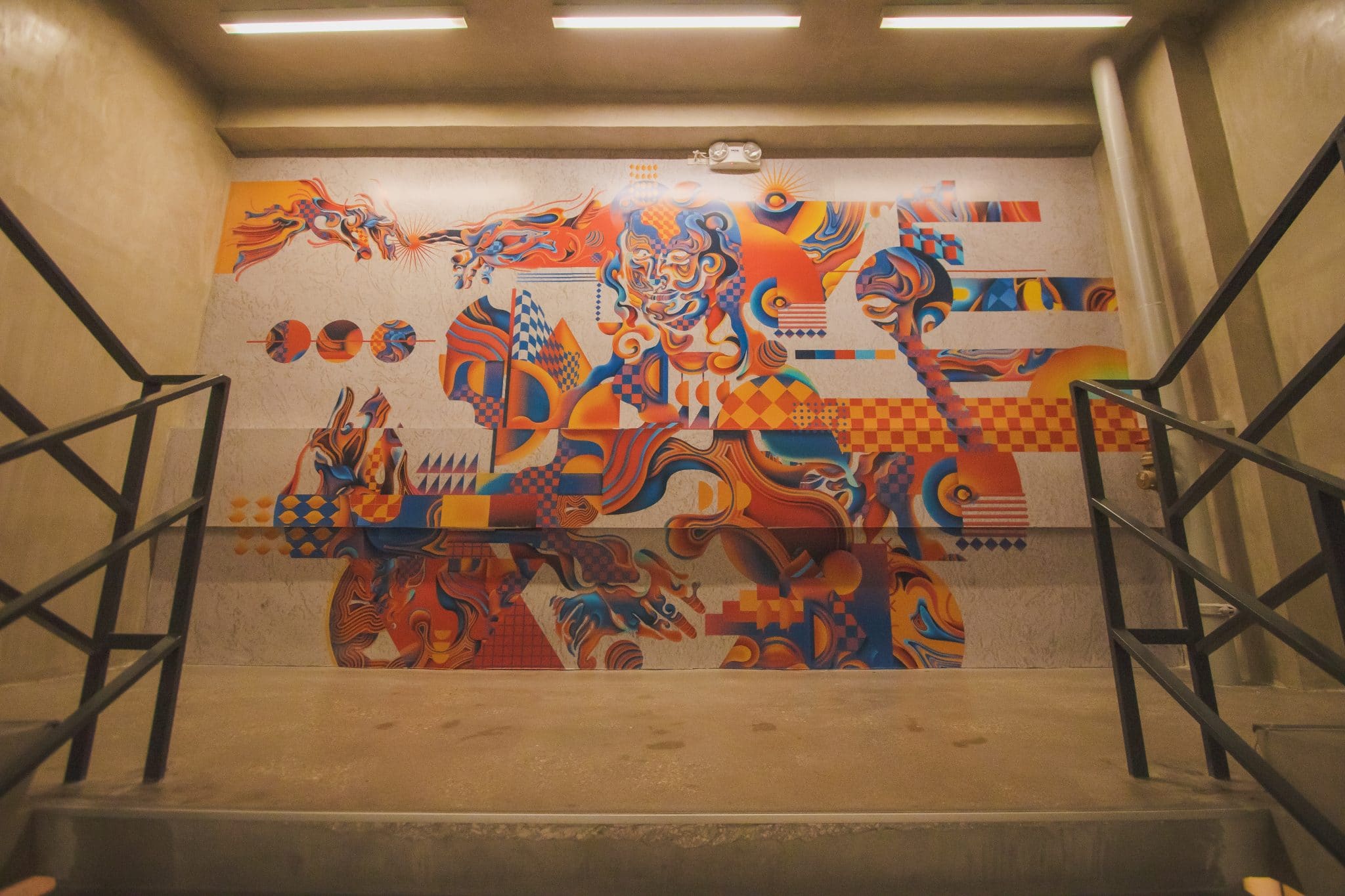 Experience the vibrant essence of innovation and creativity embodied in the captivating mural at the Interweave campus.