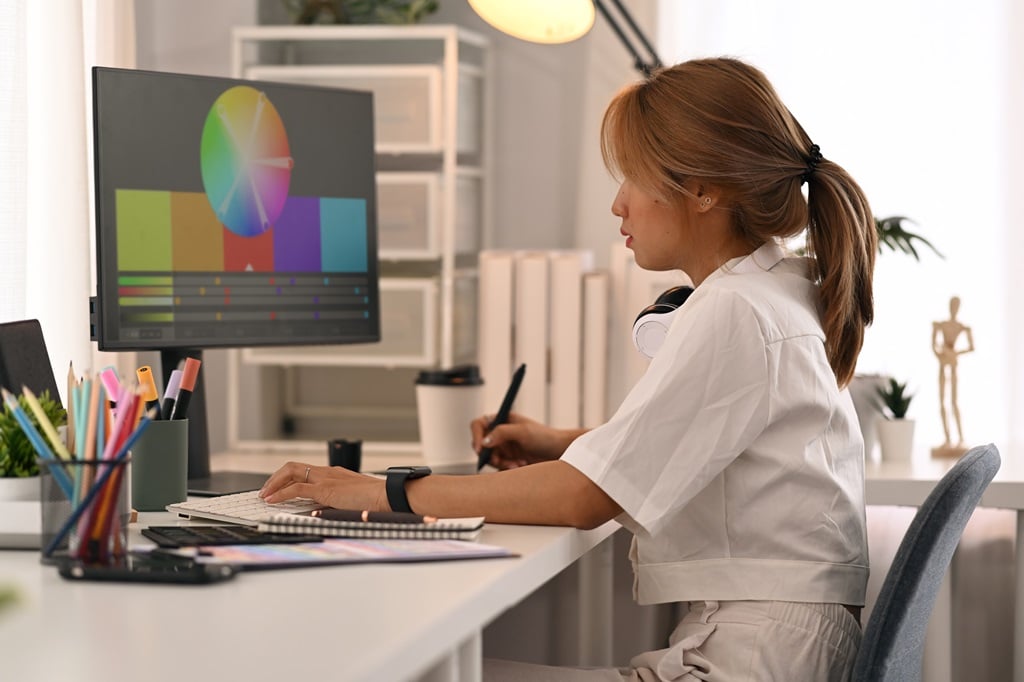 digital artist at work on their computer