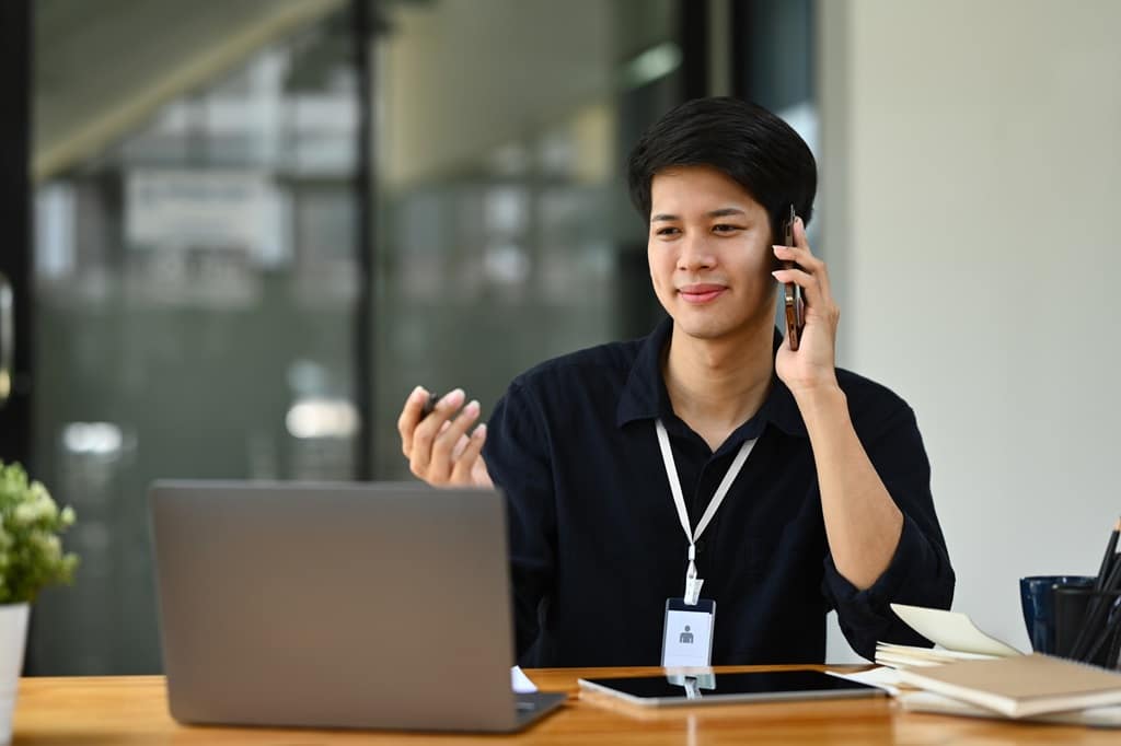 focused young entrepreneur on a call