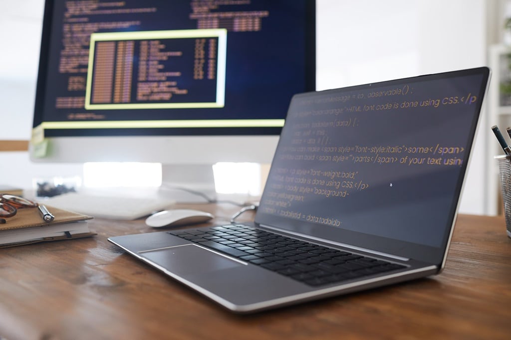 laptop screen displaying various programming languages