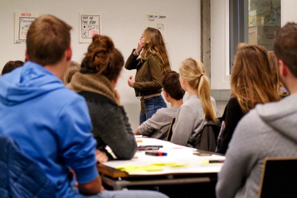 students taking up ABM strand attending a class presentation