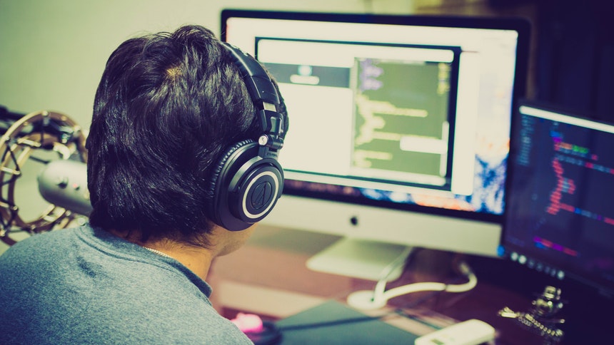 A student on his computer, video gaming as a common pastime